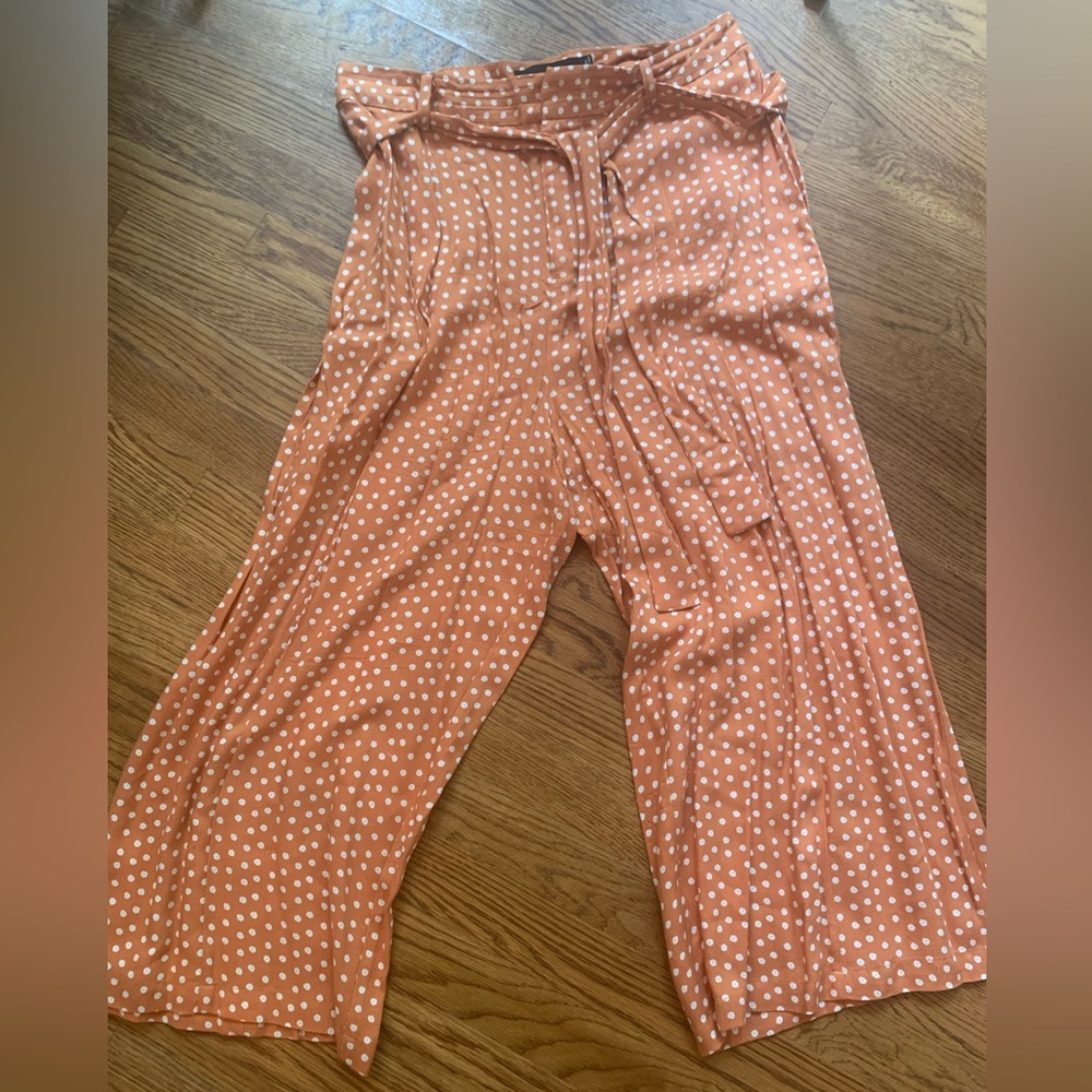 Size L Mink Pink flowy rust pants with tie belt.